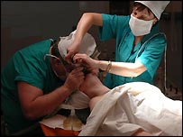 A surgeon prepares for an operation.jpg