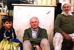 Image: Dan Cruickshank (centre) with two friends in Iraq