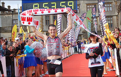 Ironman champion Steve Bayliss crossing the finish line.