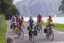 Touring cyclists by lake