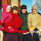 Elaine's family at the time of the story in the garden of their house near the Ormeau Park. Pictured from left - Elaine's daughter Maeve in her arms, Sean, Rian and Owen at the front.
