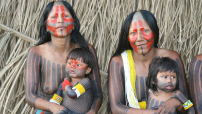 One of the Kayapo families. The women have shaved a distinctive V shape into their scalp.
