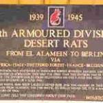 A "Desert Rats" plaque outside the Stanford Battle Area.Thetford Forest is amongst its impressive geographical battle honours.The divison trained around Stanford,Tottington and West Tofts from Jan-May 1944.There is no permanent recognition of the deserted villages.Only Tottington's war memorial stands alone by a Breckland road .