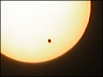 Venus in the middle of its transit across the sun