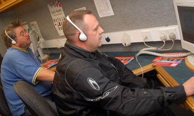 Learners enjoy the Big Welsh Challenge on board the Cyber bus