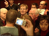 Protestors at report launch