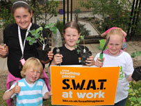 Members of the SWAT team get prepared