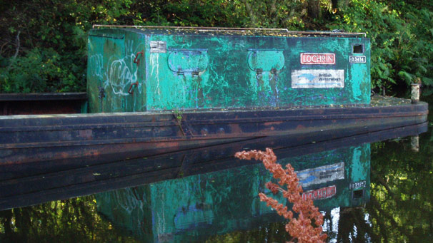 A barge floating on a canal