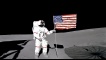 Astronaut Alan B. Shepard Jr., Apollo 14 Commander, stands by the U.S. flag on the lunar Fra Mauro Highlands