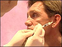 Mike Wood receiving an injection