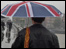A man with an umbrella