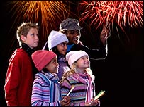 A family watching fireworks