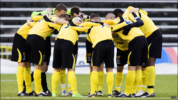 The Livingston players in a pre-match huddle