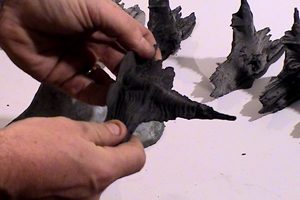 Seamus is a sculptor working with the knots from dead trees, he finds them in a nearby wood.