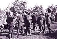 Photo of the British West Indian Regiment relaxing outside their camp