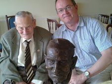 Emile Collins with Constable Simon Crowcroft and his bust