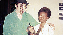 Michael Jackson with Marie-Claude and his pet chimpanzee