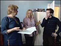 Patricia, Judy and David performing an exorcism