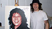 Stuart Cable with a painting made for Tsunami Relief Cardiff, 2005