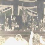 In those extraordinary times the adults at St Georges barracks — mostly evacuees from the bombing themselves — worked hard to give us children ordinary experiences. We had a rudimentary school and this Robin Hood scene is from an entertainment organised by Mrs Oakford in 1941. I am second from the left.