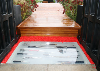 Knives confiscated by police set into resin blocks