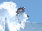 Man skiing through the snow