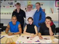 Young people at a desk