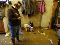Sweeping flooded house