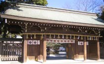 Gate of the Toga shrine in February, with blossoming trees visible
