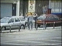 Person being mugged in the street