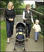 Ruth Langford and Sarah Lewis walking with Joseph