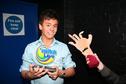 Tom Daley with his award... and a fake hand. Why not?