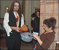 A make up artist creates the chest wound and heart