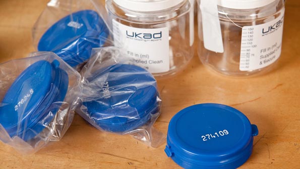 These are the bottles, complete with their lids and seals, that need to be filled