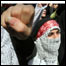 Mulheres iranianas vestidas de mulheres-bomba protestam contra Israel