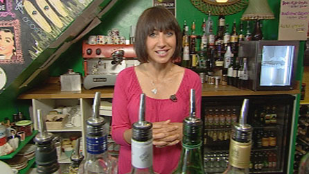 Image of Lucy Owen behind a bar