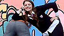 Olive leaning on Cameron's bum