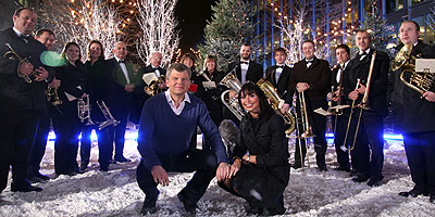 Adrian and Christine with brass band