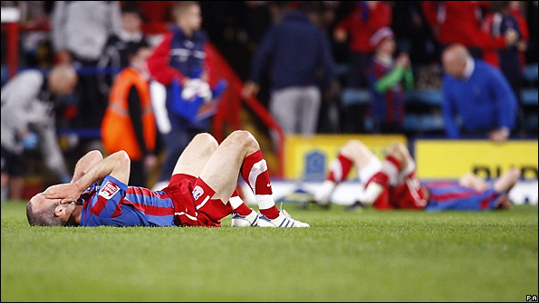 Crystal Palace players show their frustration after failing to defeat West Brom.
