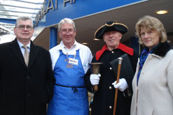 John Ayers, Manager Bury Market, Merv, Town crier Bob Grundy and Food and Farming Awards judge Christine Tacon at Bury Market.