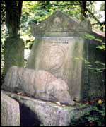 Tomb surrounded by trees and shrubs