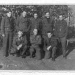 Colin Dilly (centre, kneeling) and colleagues, probably in Stalag Luft III.
