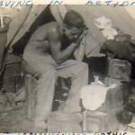 September 06, 1944 - Sergeant Arthur Ward shaving in action using 25 pounder “Ammo” boxes for a bathroom on the Gothic Line in Italy close to the Republic of San Marino.