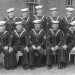 DRAKE CLASS OF SECOND CLASS STOKERS MARCH 1936 HAVING COMPLETED EIGHT WEEKS BASIC TRAINING SEAMAN P / O BROWN CENTRE FRONT RANK I am the third left rear rank on my right is Charlie Camel second right is Bill Bendall, second left front row is Taffy Thomas and second right front is Hubbard these were very good mates and we all served on H M S Hood 1936 - 1939 The only one of these I met after leaving Hood was Hubbard.