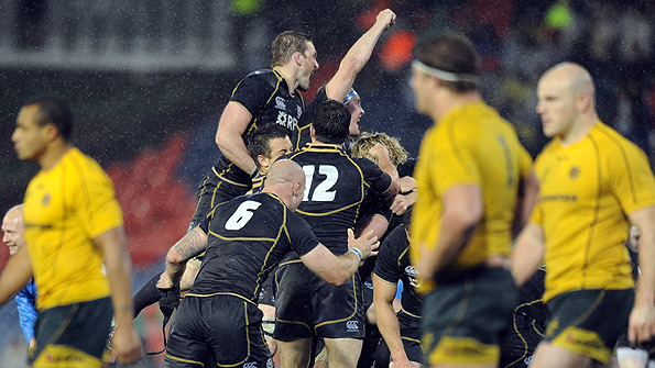 The Scotland players celebrate after their dramatic late win against the Wallabies, the first of three summer Tests. Photo: Getty