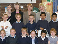 volunteers and children