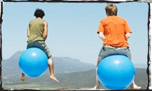 children playing on blue space hoppers