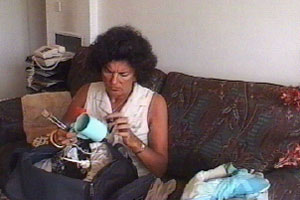 Jennifer unpacks her bag