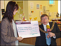 Kate and Gary Hunt with the Ruby Rainbow cheque