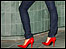 Someone's jeans and shoes